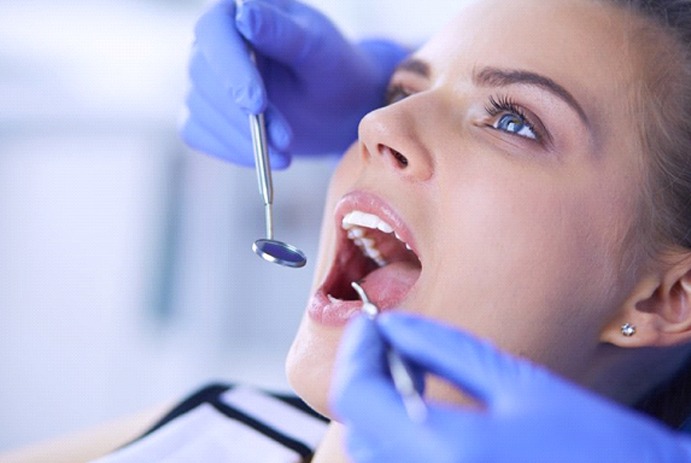 young woman at her dental checkup in Fort Worth