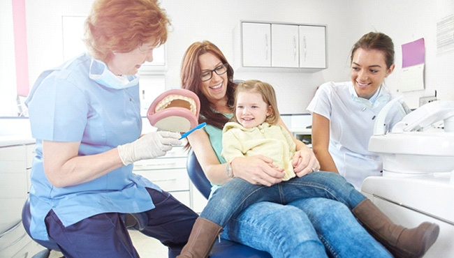 mother and daughter at a dental checkup