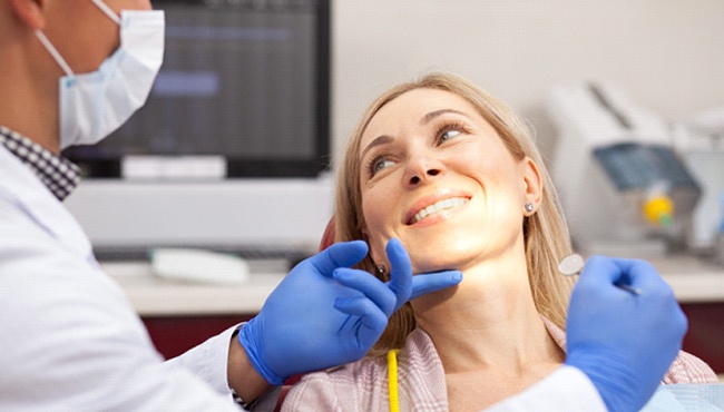 Woman at dentist for a smile makeover