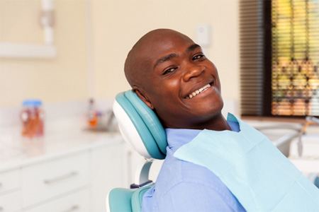 Man smiling after getting cosmetic dentistry in Fort Worth