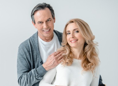 Smiling older man and woman