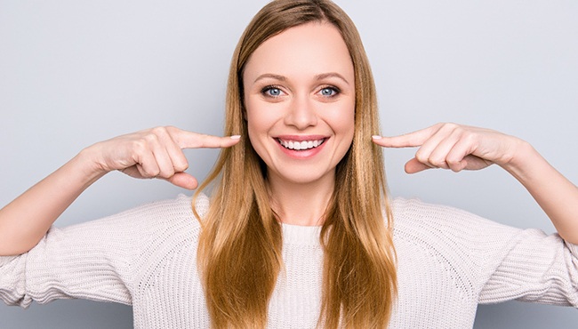 Woman with Invisalign in Ft. Worth
