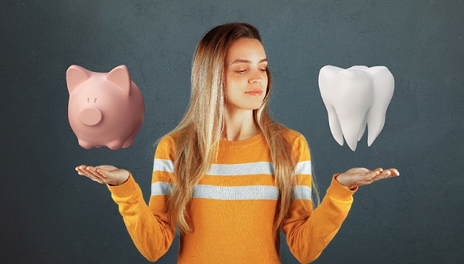piggy bank and tooth for cost of Invisalign Fort Worth