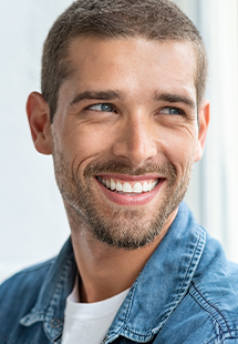 young man smiling in the TCU area