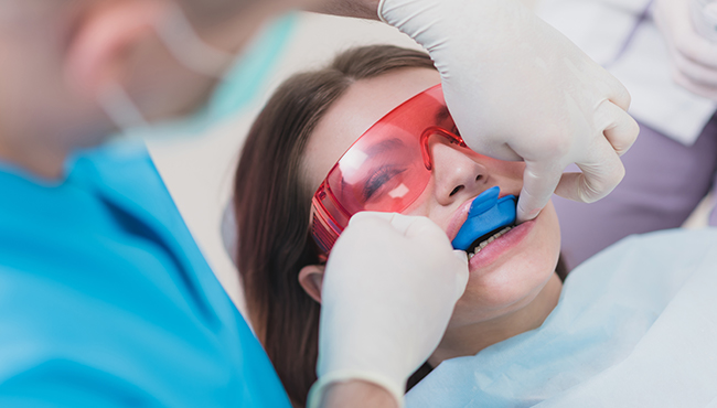 Patient receiving fluoride treatment