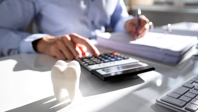 tooth and calculator cost of root canal in Fort Worth
