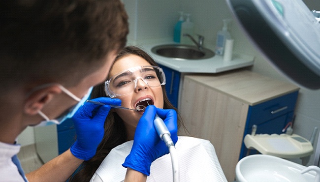 woman getting root canal in Fort Worth