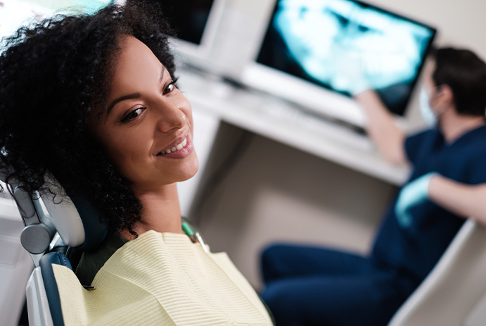 Smiling woman in state of the art dental office