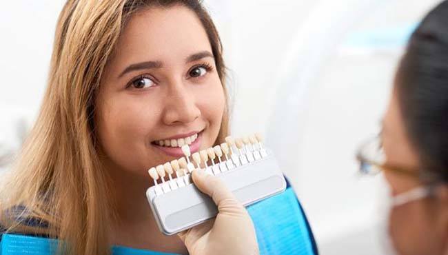 woman getting fitted for veneers