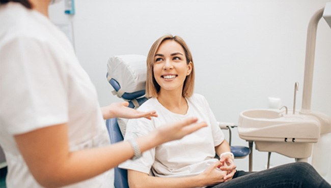 Patient learning about cost of teeth whitening in Fort Worth