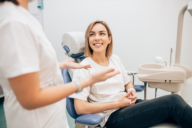 Dentist talking to patient about treatment options