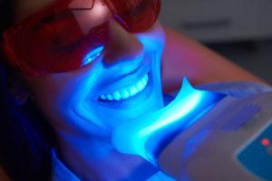 woman receiving professional teeth whitening in fort worth