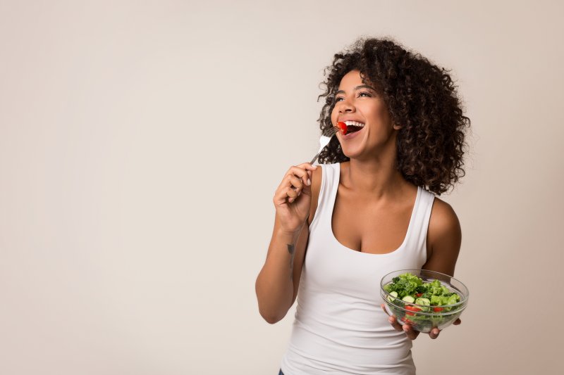 woman eating healthy salad